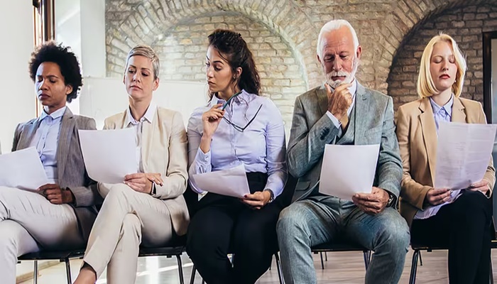 Older job seekers may be hurting their chances of landing a job. A career coach shares 5 strategies to avoid self-sabotage.